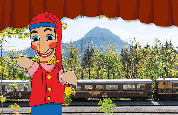 Kasperlfigur vor dem Ötscherbärzug
