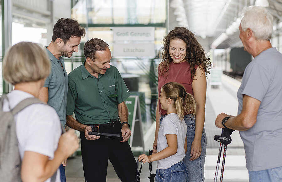 Family in train station